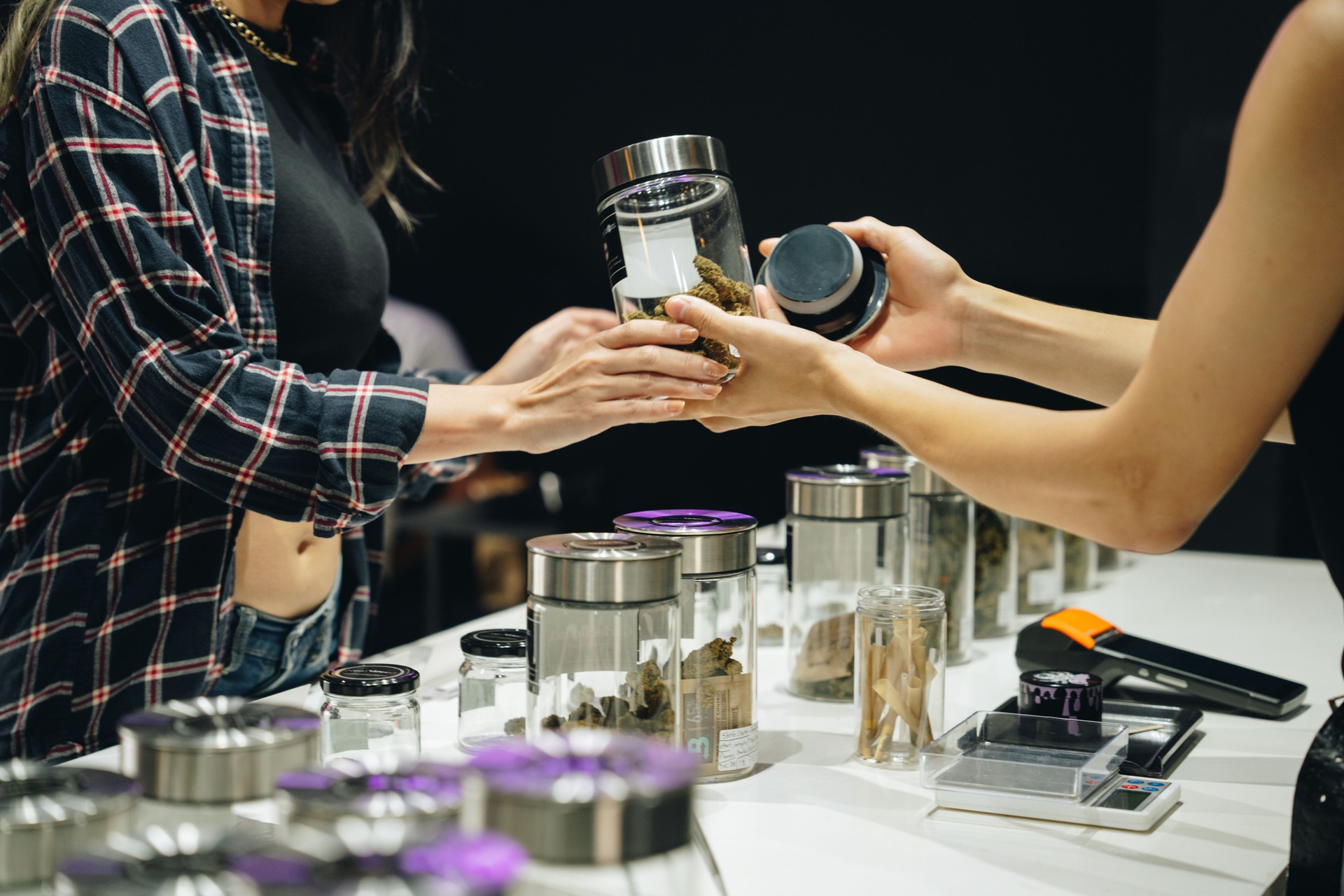 The process of choosing and buying cannabis.